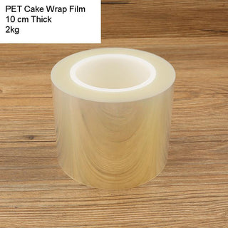 10cm Plastic Clear Thick Cake Wrap Film - 1 Roll on a wooden table 