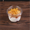 9oz Clear Plastic Dessert Cup milk dessert bakery on a wooden desk