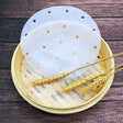 Non-Stick Round Steamer Paper on a bamboo steamer