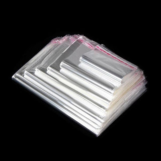 Transparent Self Adhesive OPP Bag  in black background stacked together