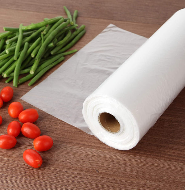 Clear Plastic Roll Bag for checkout super market with groceries roll on a desk